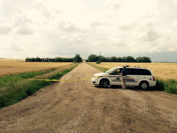 RCMP investigate the discovery of a body northwest of Edmonton Tuesday, August 9, 2016.