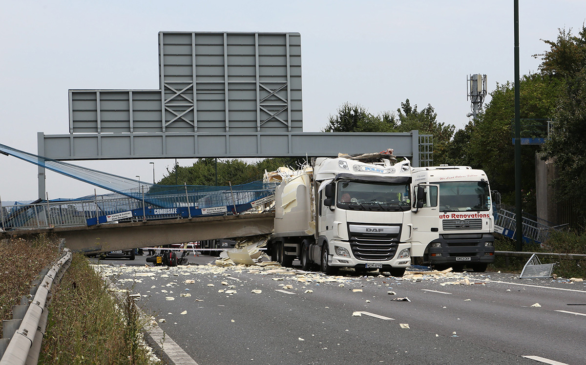 Mandatory Credit: Photo by Invicta Kent Media/REX/Shutterstock (5848510m)
Bridge collapse on the M20 in Kent
M20 Bridge collapse, Kent, UK - 27 Aug 2016.