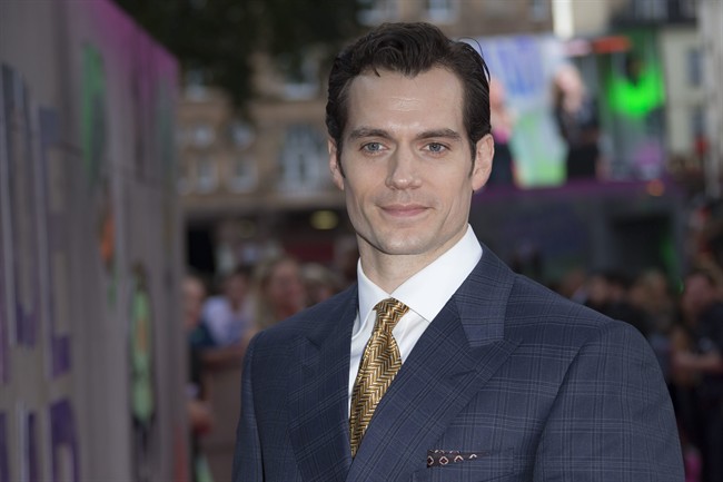 In this Wednesday, Aug. 3, 2016 file photo, actor Henry Cavill poses for photographers upon arrival at the European Premiere of Suicide Squad, at a central London cinema in Leicester Square.