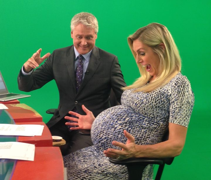 Ready or not, here comes baby! Carole Anne Devaney and Gord Steinke joking around in studio during a commercial break.