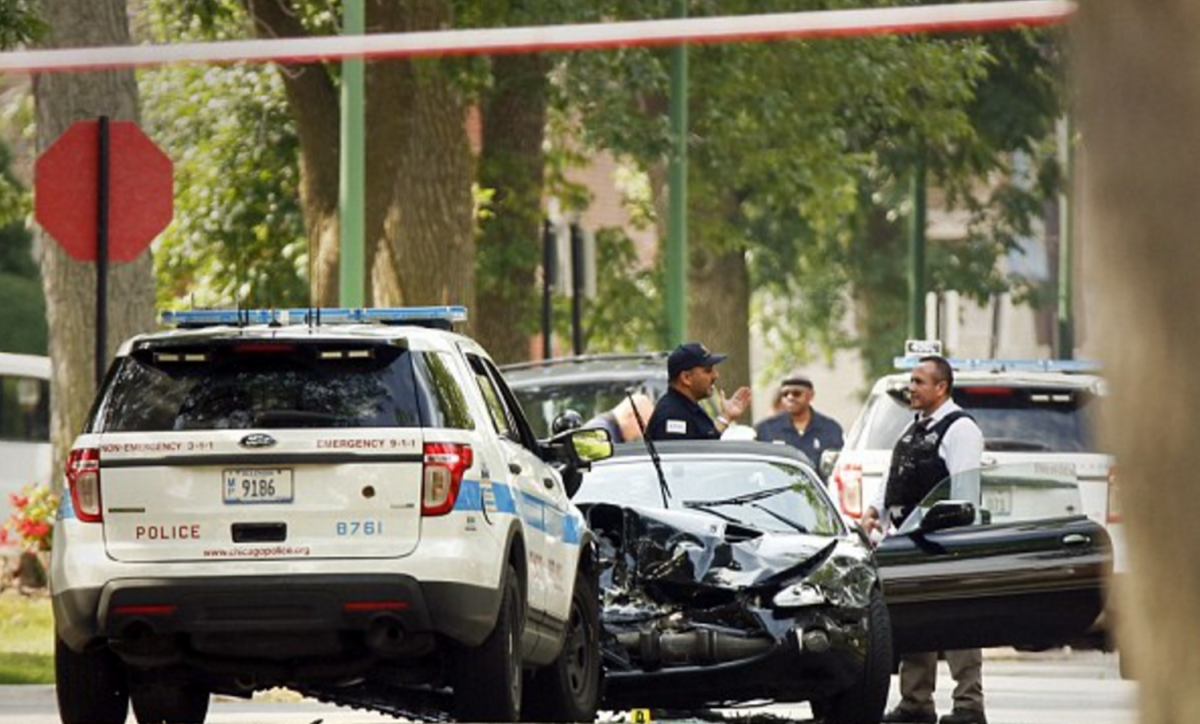 In this July 29, 2016 file photo, Chicago police investigate a police- involved fatal shooting in Chicago’s South Shore neighbourhood.