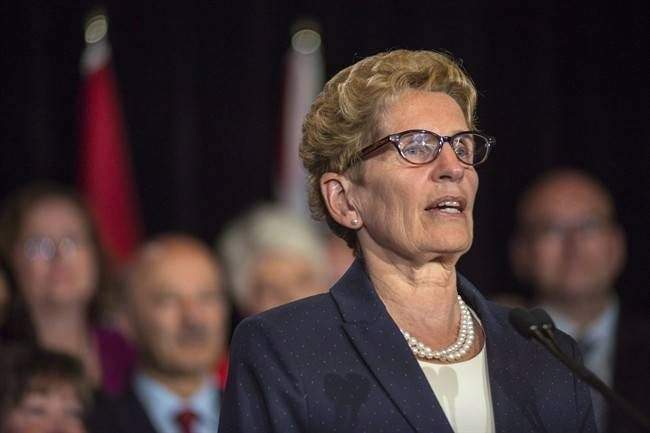 Ontario Premier Kathleen Wynne talks to media at her first press conference after the announcement of a cabinet shuffle at Queen's Park in Toronto, on Monday June 13 , 2016.