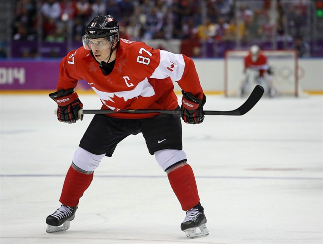 Canada’s Sidney Crosby waits for a face-off against Sweden during the first period of the men’s gold medal ice hockey game at the 2014 Winter Olympics, Sunday, Feb. 23, 2014, in Sochi, Russia. Hockey Canada has named Pittsburgh Penguins star Crosby as captain for the upcoming World Cup of Hockey.