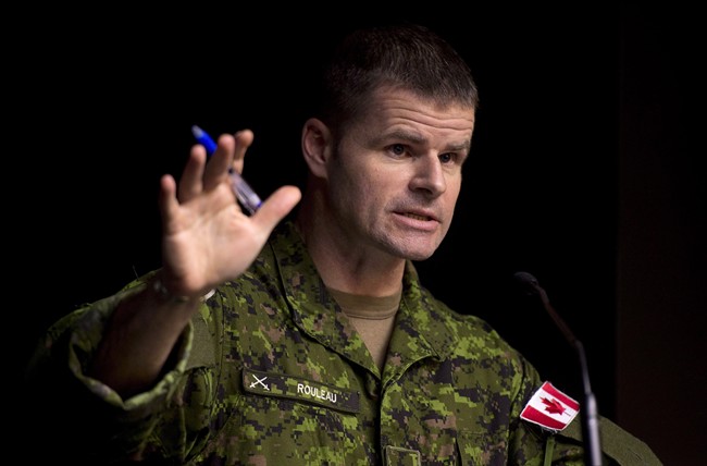 Maj.-Gen. Michael Rouleau speaks during a technical briefing Monday, January 19, 2015 in Ottawa. Canada's top special forces soldier is facing a court martial after accidentally firing his rifle while loading it during a visit to Iraq last December.THE CANADIAN PRESS/Adrian Wyld.