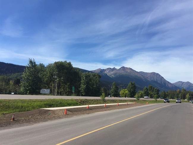 On a lonely stretch of concrete in Smithers, B.C., a black-and-white sign cautions passersby: "The end is near.".