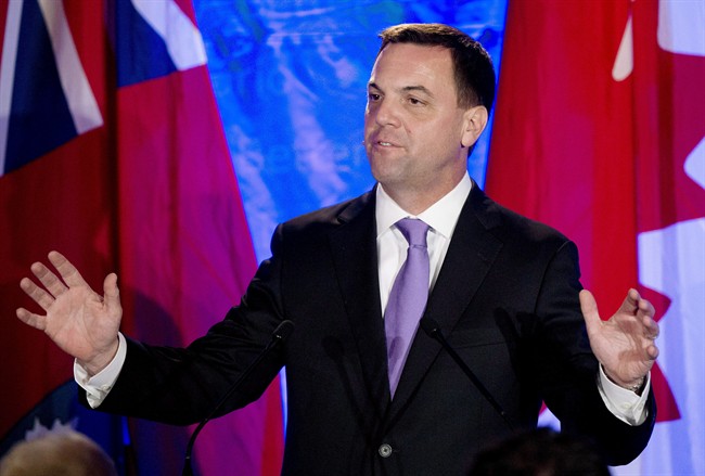 Ontario Progressive Conservative leader Tim Hudak announces that he will be stepping down as party leader after being defeated at his election night campaign head quarters in Grimsby, Ont., on Thursday, June 12, 2014.