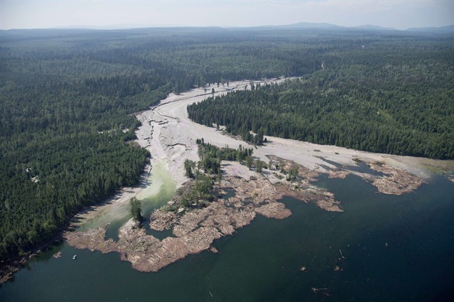 Contents from a tailings pond is pictured going down the Hazeltine Creek into Quesnel Lake near the town of Likely, B.C. on August, 5, 2014. It's been two years since millions of cubic metres of mine waste gushed from a tailings pond at the Mount Polley mine in British Columbia's Interior. The government says it has implemented tough new regulatory standards, while environmental groups say more protections are needed and residents just want their pristine lake back. 