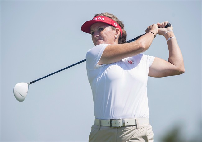 Lorie Kane of Canada hits a tee shot in women\’s individual golf at the 2015 Pan Am Games at Angus Glen Golf Club in Markham, Ont., on Thursday, July 16, 2015.