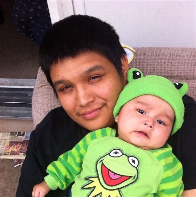 Father of three Errol Greene and his son Darien is seen in this undated handout photo. Greene died in custody at the Winnipeg Remand Centre May 1 after suffering an epileptic seizure. His wife is calling for an inquest after she says he was denied his medication for the three days he was in custody before his death. THE CANADIAN PRESS/ HO, Rochelle Pranteau .