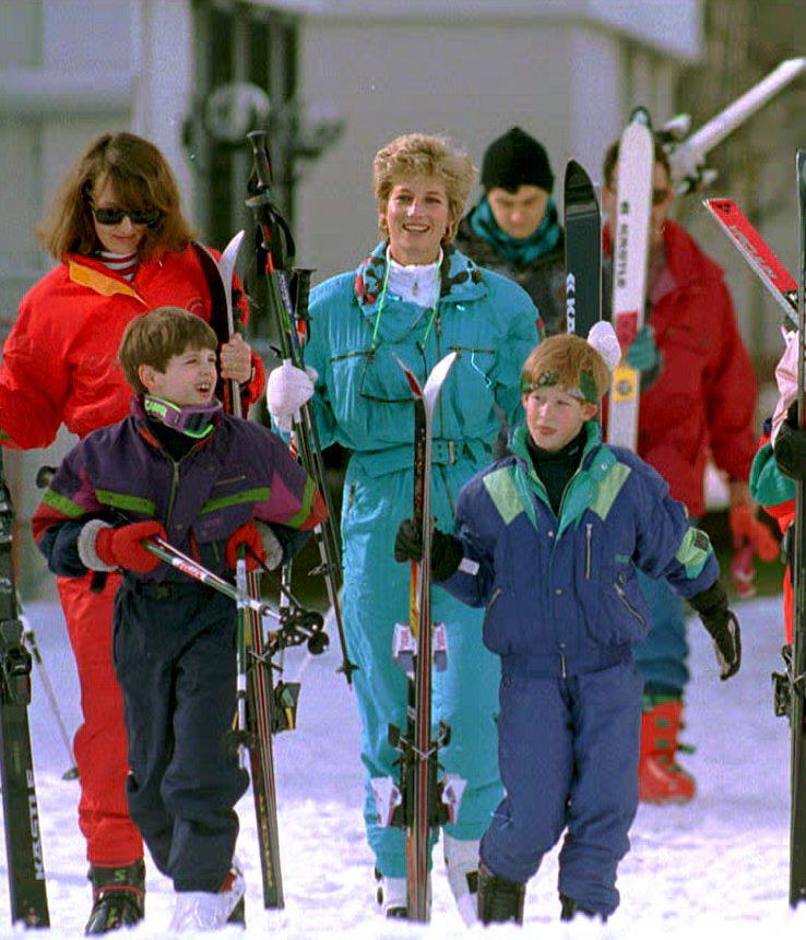 Diana, the Princess of Wales, accompanied by her son Prince Harry (R), family friend Catherine Soames (back L), and her son Harry (L).