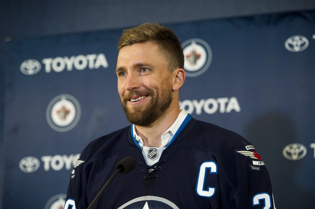 Winnipeg Jets' captain Blake Wheeler speaks to the media during a press conference in Winnipeg on Wednesday, August 31, 2016. T.