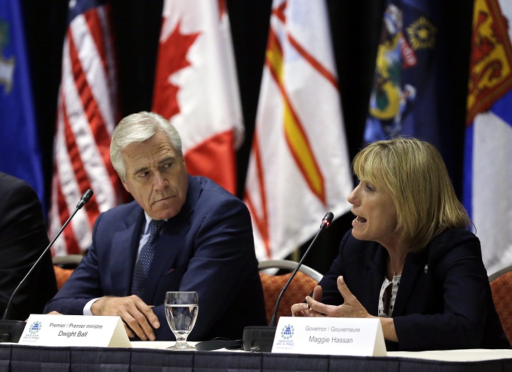 New Hampshire Gov. Maggie Hassan, right, speaks as Newfoundland and Labrador Premier Dwight Ball listens during a news conference after a meeting of the New England's governors and eastern Canada's premiers to discuss closer regional collaboration, Monday, Aug. 29, 2016, in Boston. 