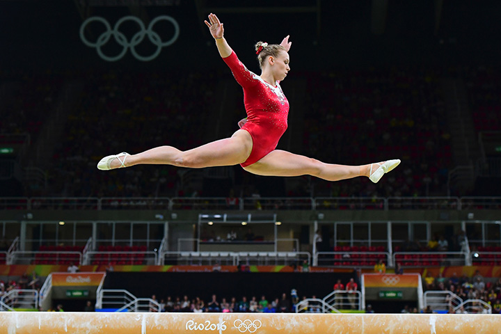 Canada's Ellie Black competes in the qualifying for the women's beam event of the Artistic Gymnastics at the Olympic Arena during the Rio 2016 Olympic Games in Rio de Janeiro on August 7, 2016. 