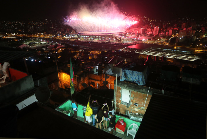 Favela residents watch Olympic fireworks