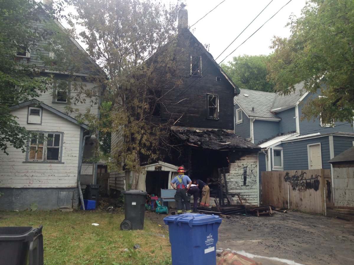 Fire crews put out the fire at this home on Victor St. Monday morning.