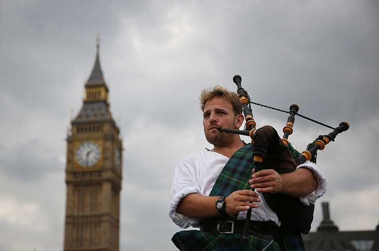 Scotsman David Whitney plays the bagpipes on in London, England in this file image. 