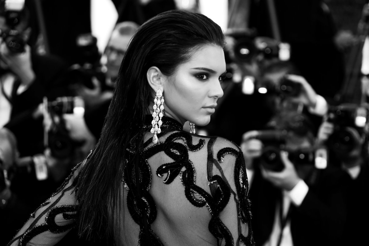 US model Kendall Jenner poses as she arrives on May 15, 2016 for the screening of the film "Mal de Pierres (From the Land of the Moon)" at the 69th Cannes Film Festival in Cannes, southern France.   