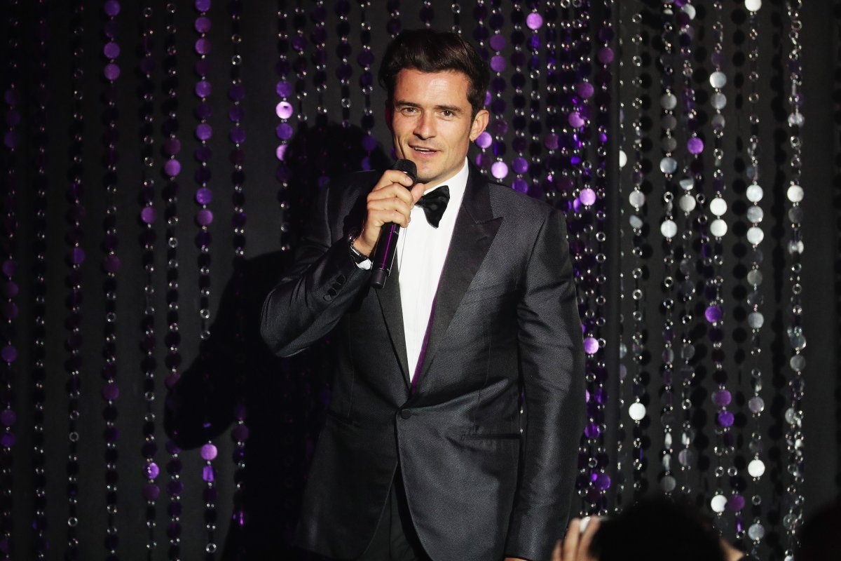 Orlando Bloom appears on stage at the amfAR's 23rd Cinema Against AIDS Gala at Hotel du Cap-Eden-Roc on May 19, 2016 in Cap d'Antibes, France.  