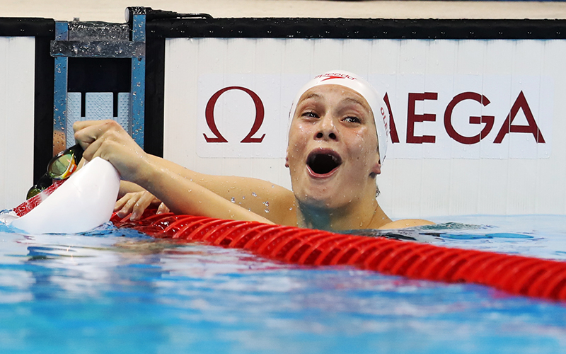 Penny Oleksiak of Canada celebrates after she wins silver in the Women's 100m Butterfly final during Day 2 of the Rio 2016 Olympic Games at Olympic Aquatics Stadium on August 7, 2016 in Rio de Janeiro, Brazil.