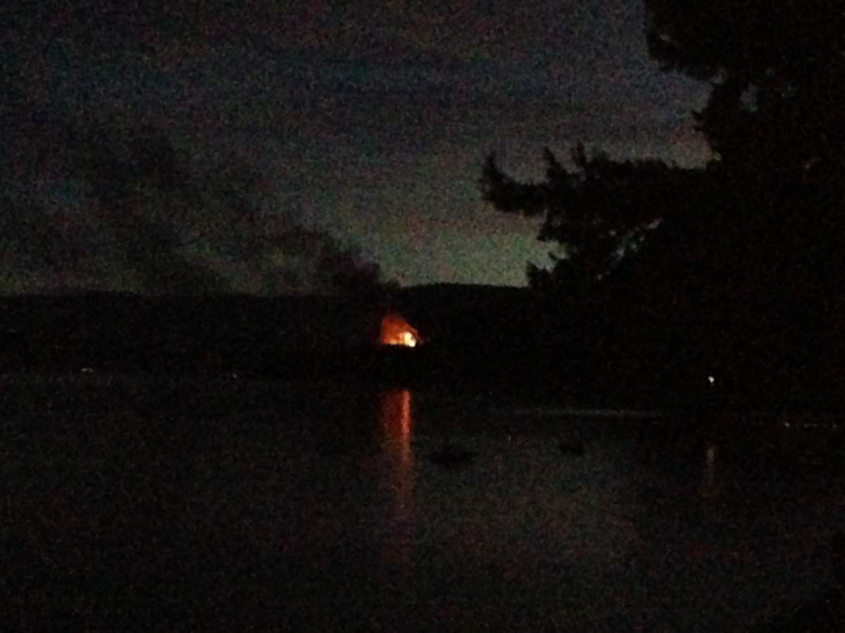 The flames and smoke from the house fire in Tappen could be seen from across the lake.