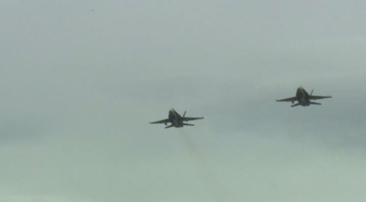 Two fighter jets flew over the Wild Rose Motocross Park Saturday.