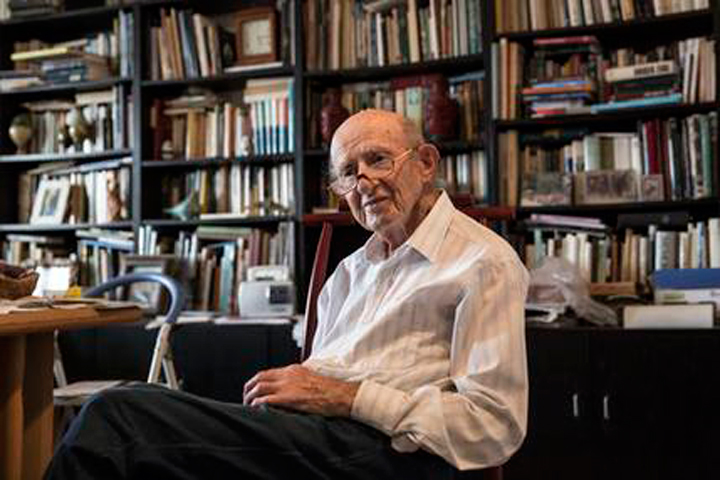 In this photo made on Monday, May 23, 2016, Joseph Harmatz sits during an interview with the Associated Press at his apartment in Tel Aviv, Israel. Harmatz is one of the few remaining Jewish "Avengers" who carried out a mass poisoning of former SS men in an American prisoner-of-war camp in 1946 after World War II. The poisoning sickened more than 2,200 Germans but ultimately caused no known deaths.