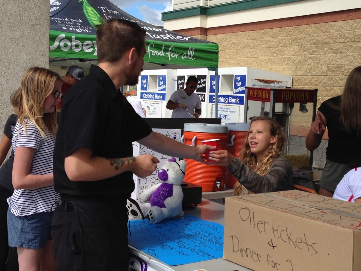Over the past seven summers, Edmonton sisters Sydney and Taylor Woodworth have raised over $50,000 for the Stollery Children's Hospital through their annual lemonade stand. 