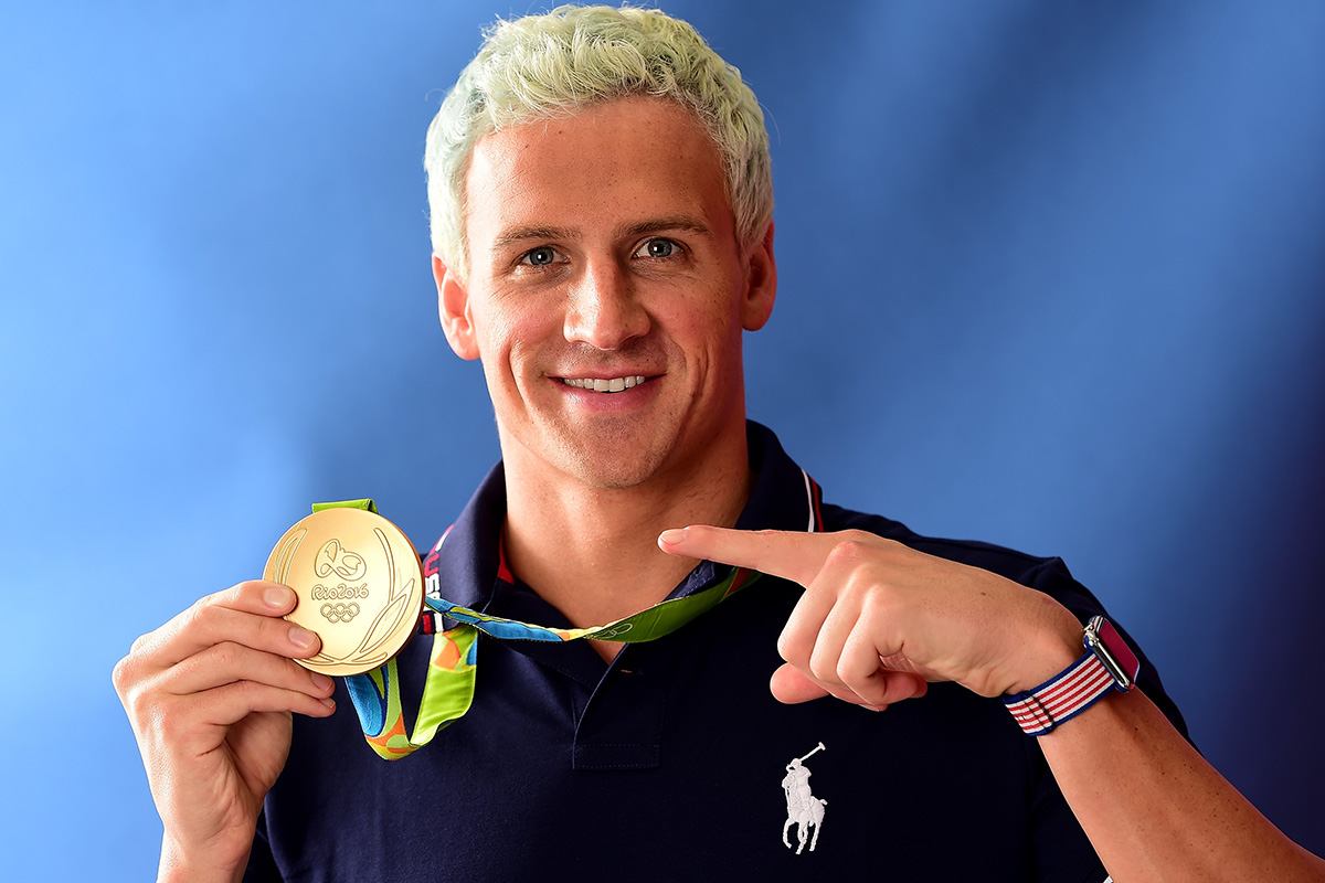 Swimmer, Ryan Lochte of the United States poses for a photo with his gold medal on the Today show set on Copacabana Beach on August 12, 2016 in Rio de Janeiro, Brazil. 