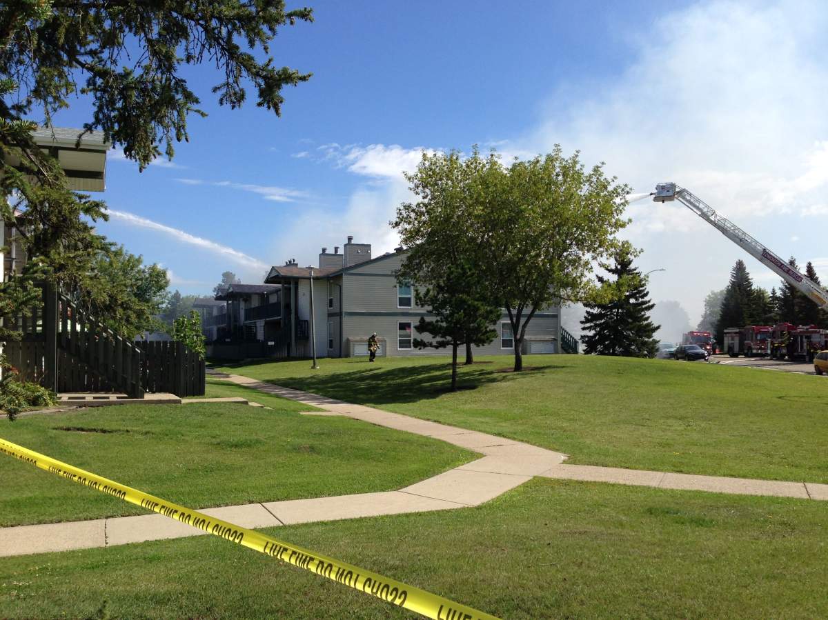 Fire crews battle a fire at a southeast Edmonton condo complex.