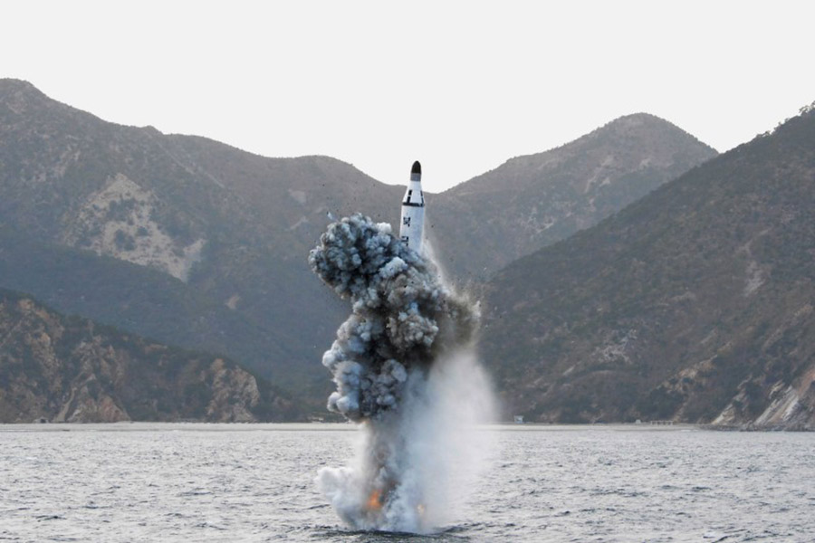 North Korean leader Kim Jong Un guides on the spot the underwater test-fire of strategic submarine ballistic missile in this undated photo released by North Korea's Korean Central News Agency (KCNA) in Pyongyang on April 24, 2016.