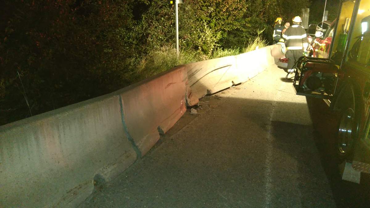 Car gets stuck on Naramata barrier - image