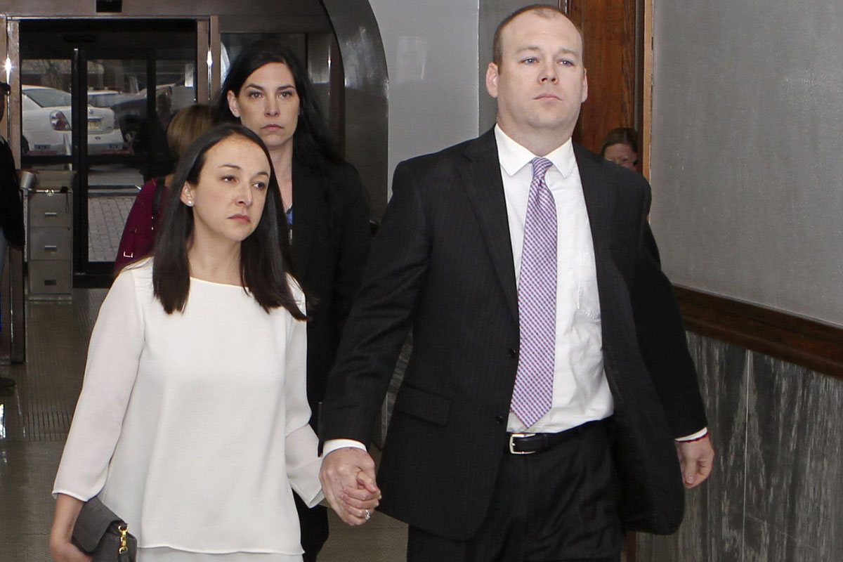  In this March 11, 2016, file photo, Garland County circuit court Judge Wade Naramore, right, accompanied by his wife, Ashley, head into the Garland County Court House in Hot Springs, Ark., for his arraignment on charges stemming from the hot car death of the couple's 18-month old son, Thomas, in 2015.