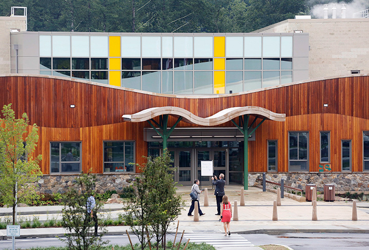 In this July 29, 2016 file photo, people attend an open house at the new Sandy Hook Elementary School in Newtown, Conn. 