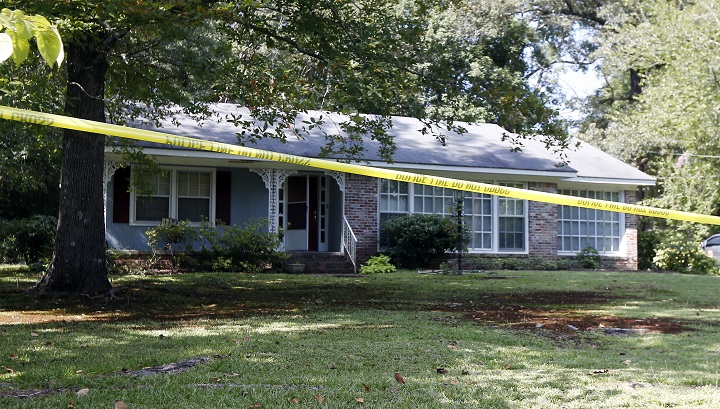 Police crime scene tape surrounds the residence of two Catholic nuns who worked as nurses and helped the poor in rural Mississippi, and were found slain in their Durant, Miss., home Thursday, Aug. 25, 2016. Authorities said there were signs of a break-in and their vehicle was missing.