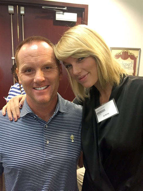 In this image provided by Bryan Merville, potential juror pop star Taylor Swift, right, poses for a photo with Bryan Merville in a courthouse waiting area in Nashville, Tenn., Monday, Aug. 29, 2016. 