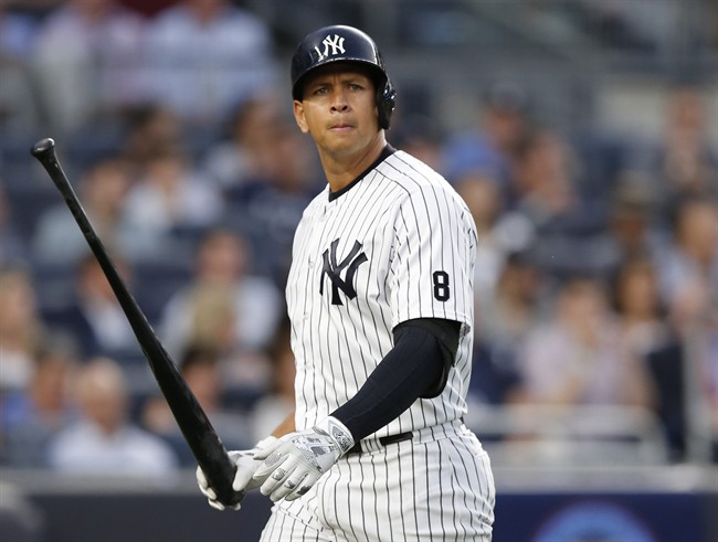 In this June 6, 2016 photo New York Yankees designated hitter Alex Rodriguez (13) reacts after striking out swinging in the fourth inning of a baseball game against the Los Angeles Angels at Yankee Stadium in New York.