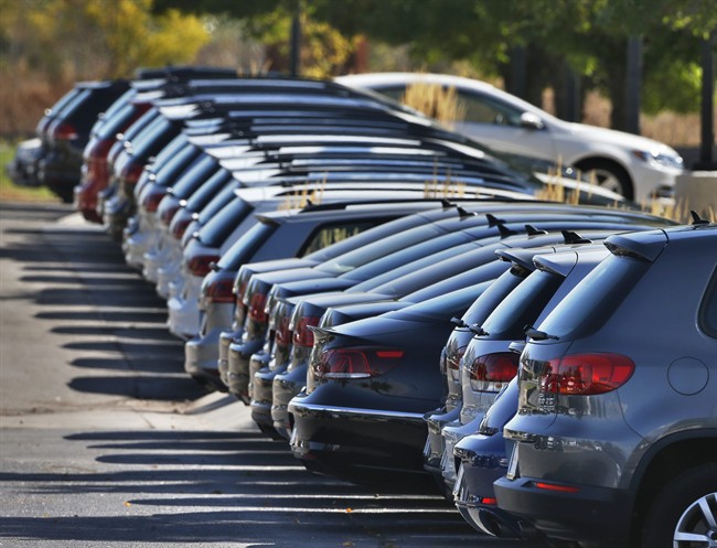 File: Cars for sale at a dealership. 