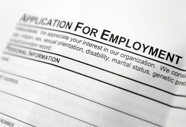An employment application form on a table during a job fair at Columbia-Greene Community College in Hudson, N.Y.