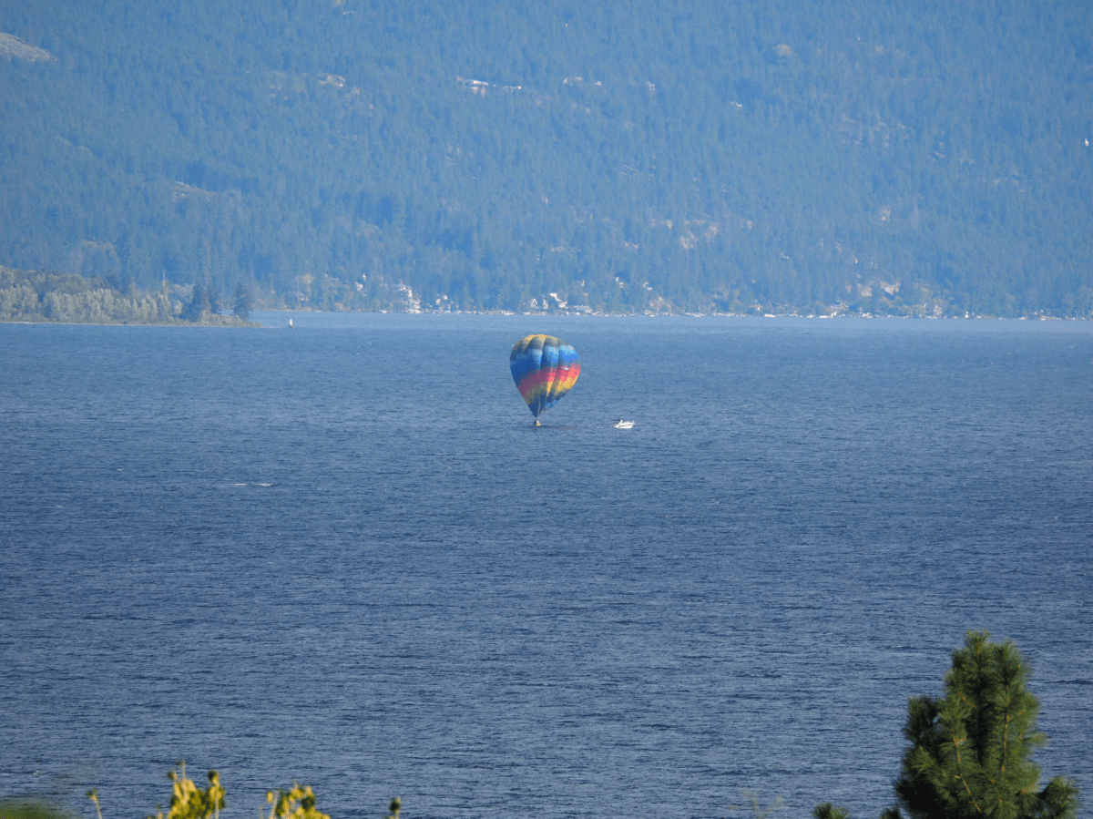 A hot air balloon landed on Okanagan Lake Sunday morning. 