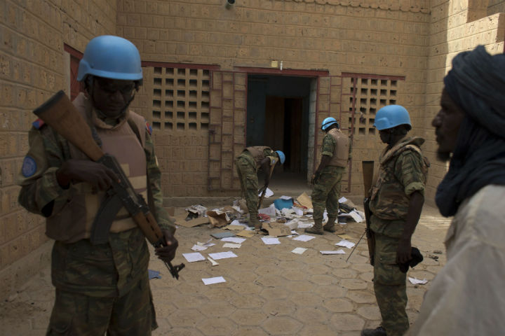 United Nations peacekeepers search a house suspected to have been used by members of al-Qaida’s North African branch in Timbuktu, Mali. The al-Qaida cell occupied Timbuktu for 10 months until January 2013