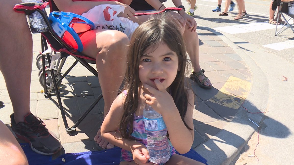 A young spectator, among the hundreds who lined Main Street and Lakeshore Drive in Penticton for the Peter Bros. Grand Parade.