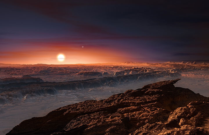 This artist’s impression shows a view of the surface of the planet Proxima b orbiting the red dwarf star Proxima Centauri, the closest star to our solar system.