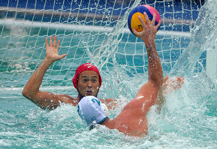 Richie Campbell of Australia attempts to score a goal against Japan during preliminary Group A water polo action at the Maria Lenk Aquatics Centre in Rio de Janeiro, Brazil on August 10, 2016. 