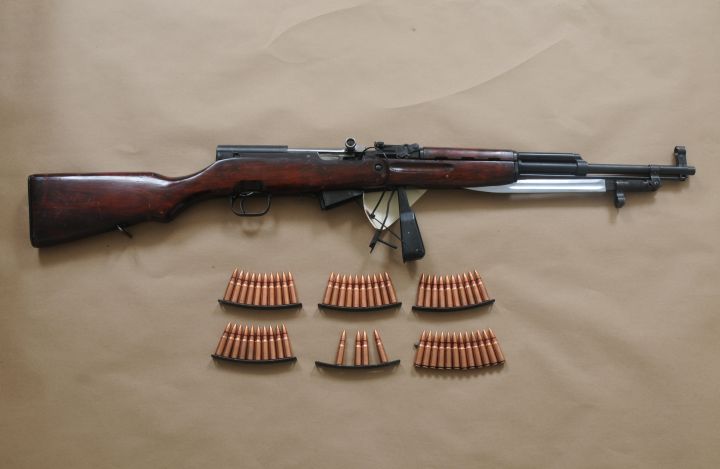 A loaded SKS rifle and 54 rounds of ammunition were seized from the suspect’s vehicle, police said.