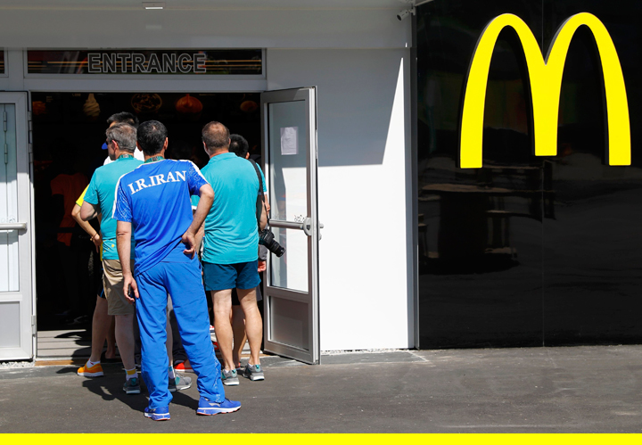 An Iranian athlete lines up at a McDonald's restaurant inside the Olympic village in Rio de Janeiro earlier this month.