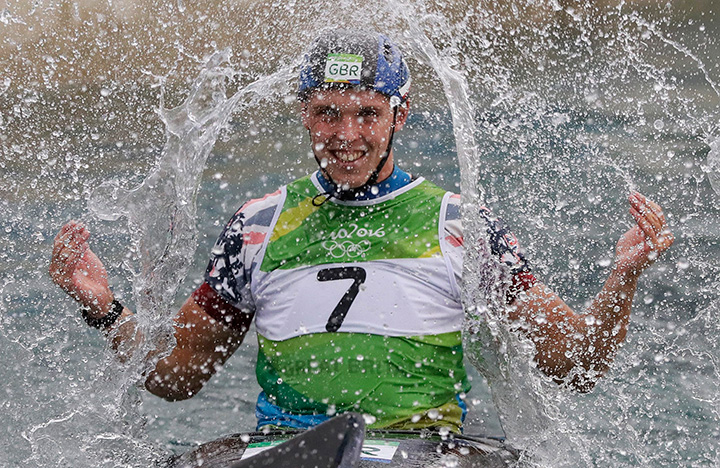 Britain’s Joseph Clarke celebrates winning the gold medal in the kayak K1 men's final of the canoe slalom at the 2016 Summer Olympics in Rio de Janeiro, Brazil, Wednesday, Aug. 10, 2016. 
