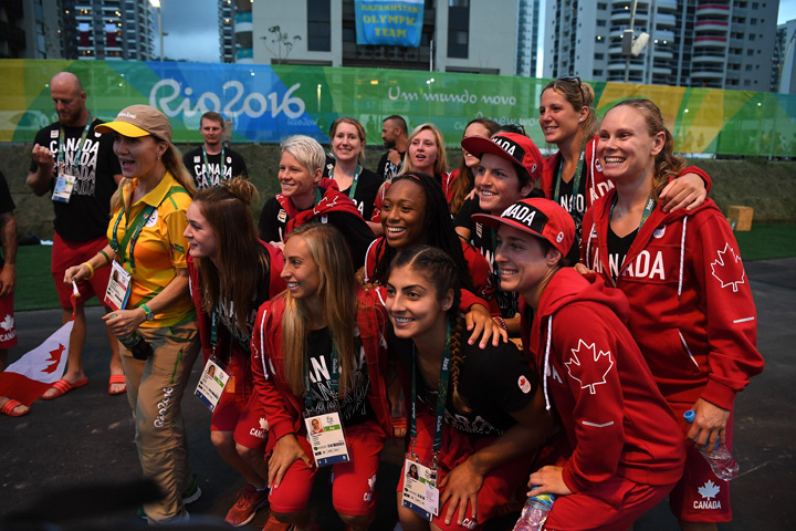 Team Canada athletes pose for a photo