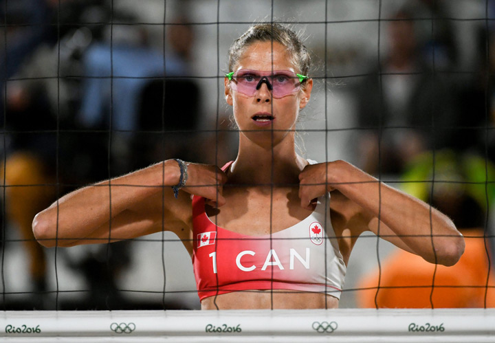 Canada’s Sarah Pavan competes in the women’s beach volleyball qualifying match between Canada and Germany at the Beach Volley Arena in Rio de Janeiro on August 11, 2016, for the Rio 2016 Olympic Games.