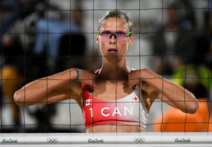 Canada's Sarah Pavan competes in the women's beach volleyball qualifying match between Canada and Germany at the Beach Volley Arena in Rio de Janeiro on August 11, 2016, for the Rio 2016 Olympic Games.