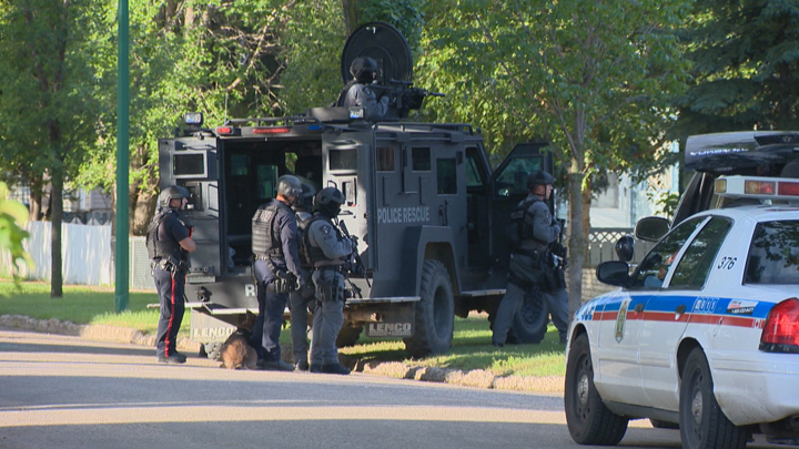 Saskatoon police believe a raid on Thursday is linked to a July raid in the same block when 40 stolen bicycles were recovered.